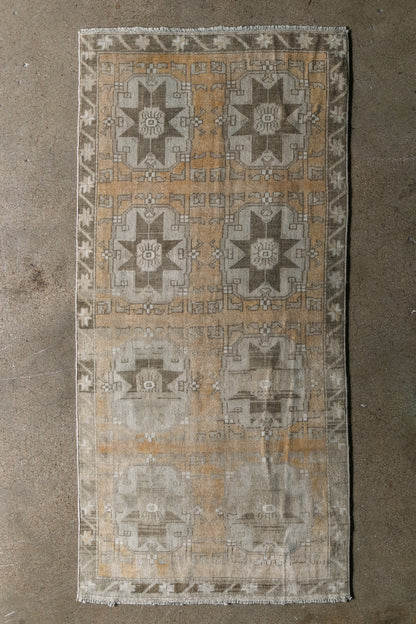 Vintage Turkish (3x7) Faded Amber and Ivory Hand-Knotted Wool Rug