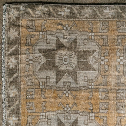 Vintage Turkish (3x7) Faded Amber and Ivory Hand-Knotted Wool Rug