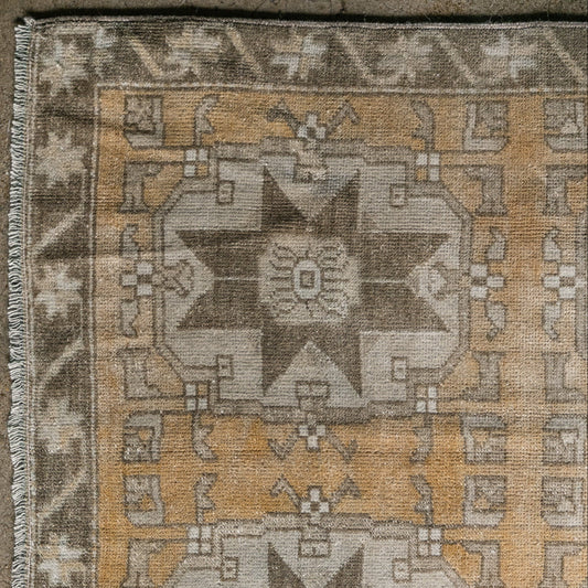 Vintage Turkish (3x7) Faded Amber and Ivory Hand-Knotted Wool Rug